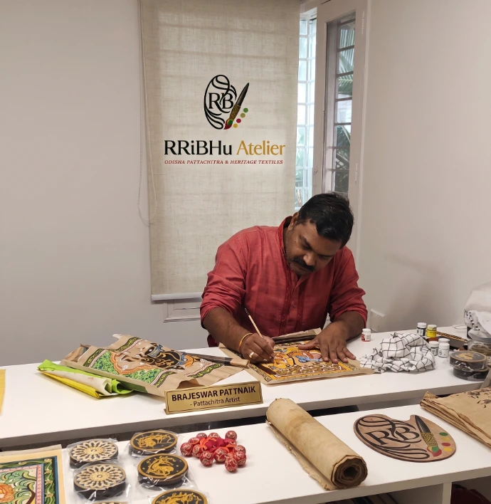 Master Artisan Brajeswar Pattnaik showcasing traditional Odisha Pattachitra art